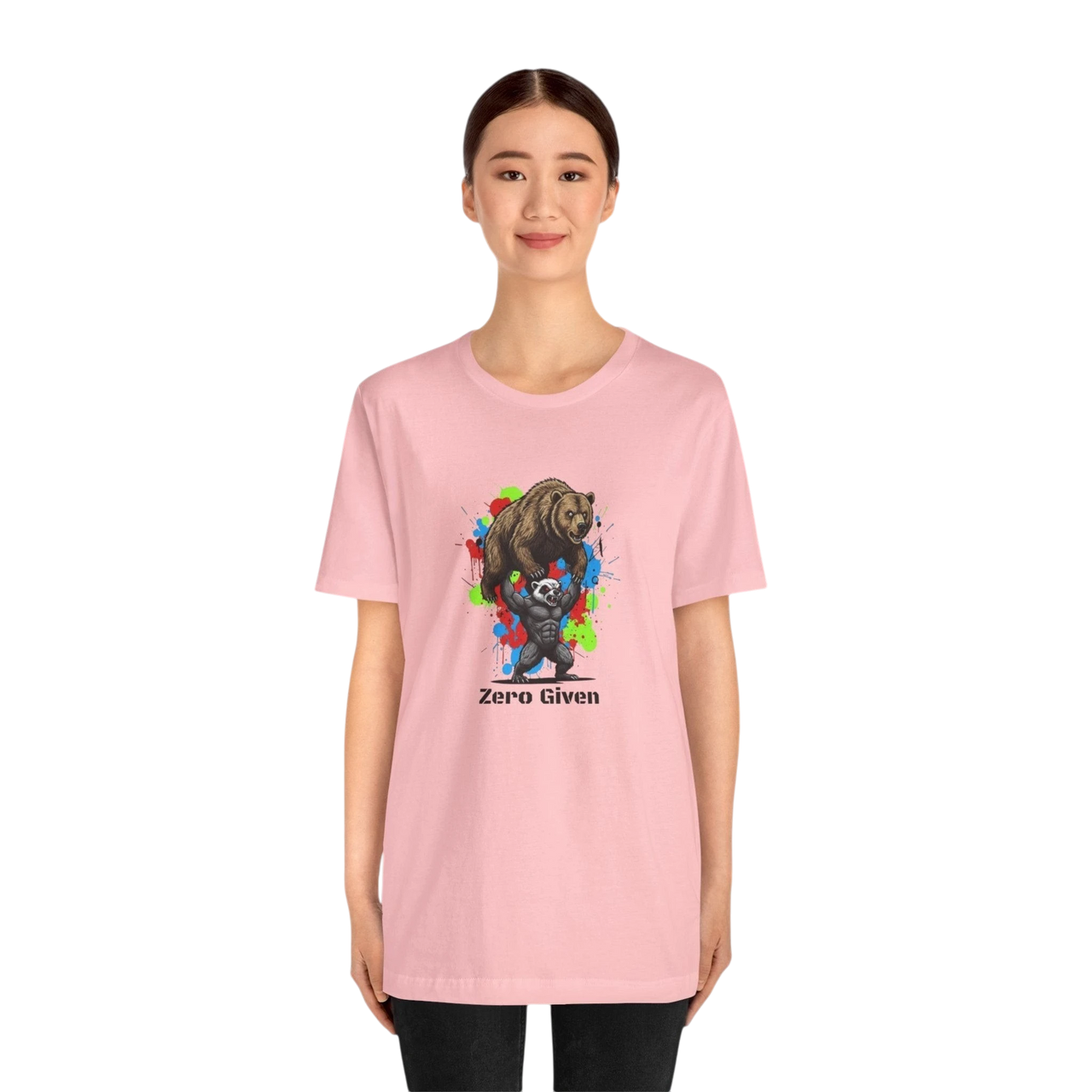 DailyThreadCo pink 100% cotton t-shirt with 'Zero Given' graphic of a honey badger lifting a bear, set against a colorful paint splash background.