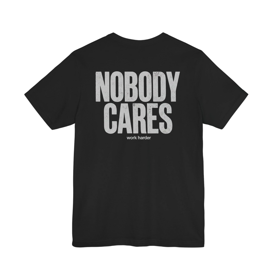 DailyThreadCo. black cotton graphic t-shirt featuring Nobody Cares Work Harder text in a distressed white font.