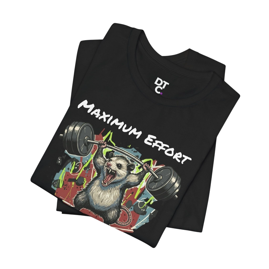 DailyThreadCo. black 100% cotton t-shirt with a graphic of a possum lifting a barbell with the text "MAXIMUM EFFORT".