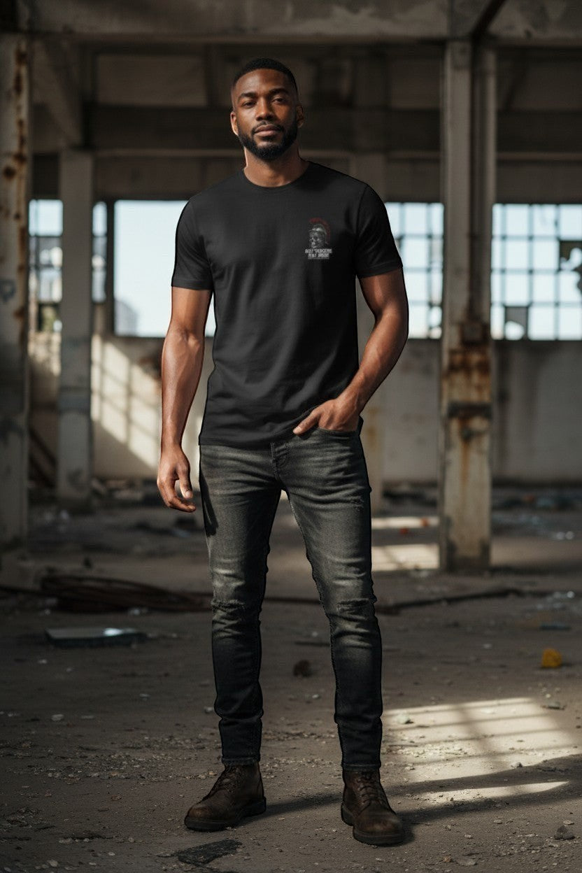 DailyThreadCo. black 100% cotton t-shirt with a Roman skull graphic and "Aut Vincere Aut Mori" text. Model is wearing it with jeans.