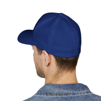DailyThreadCo. blue structured Flexfit cap worn by a man in a denim jacket, featuring a classic mid-profile design.