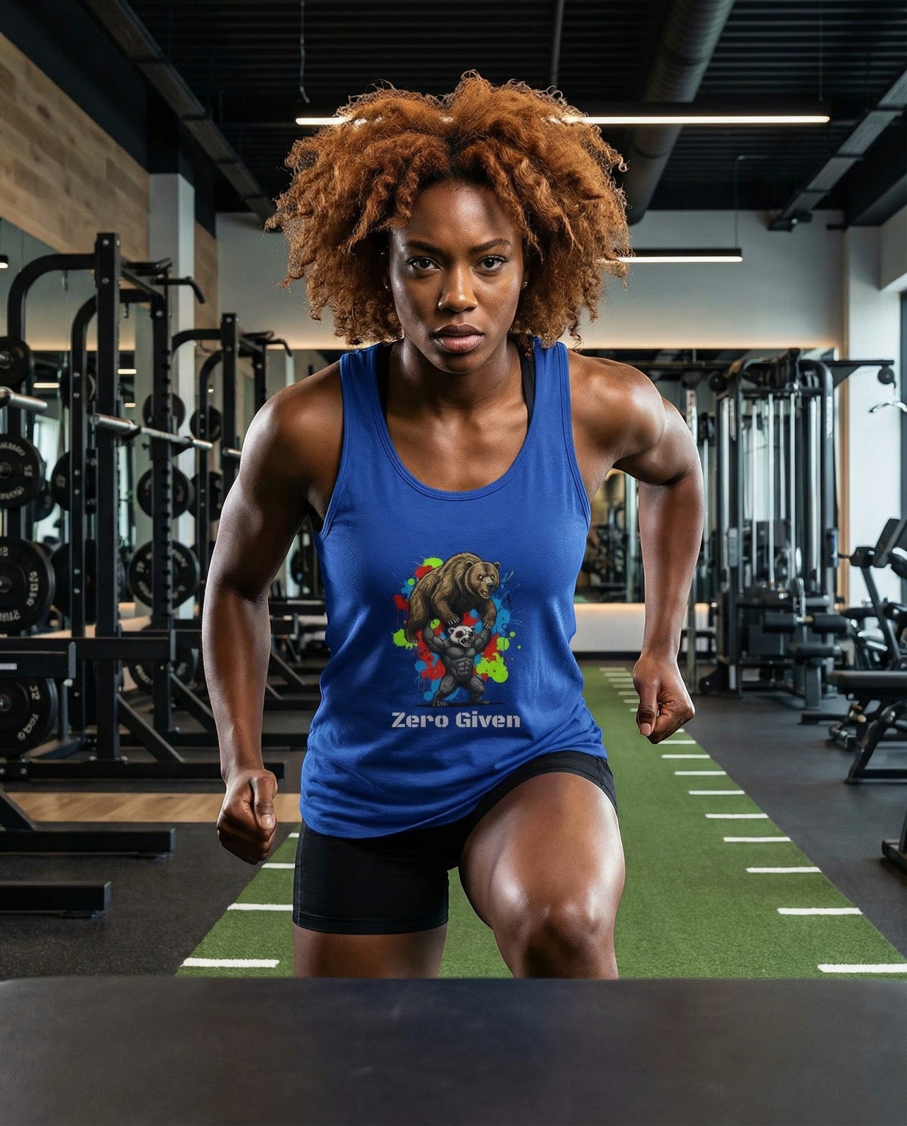 DailyThreadCo. blue cotton graphic tank top with bear and panda art and "Zero Given" text, worn by a woman in a gym.