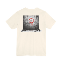 DailyThreadCo. cream cotton t-shirt with a graphic print of tally marks on a concrete wall with red dripping paint and the words 