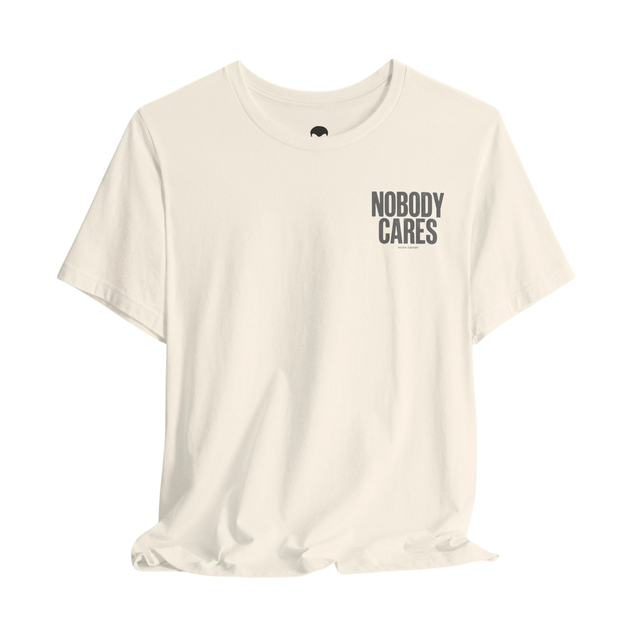 DailyThreadCo. cream cotton graphic tee with Nobody Cares text on the chest, featuring a crew neck and retail fit.