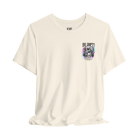 DailyThreadCo. cream 100% cotton t-shirt with a skull graphic holding a barbell and neon streaks. Text reads 
