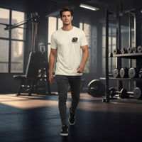 DailyThreadCo. cream cotton t-shirt with a skull and barbell graphic and 