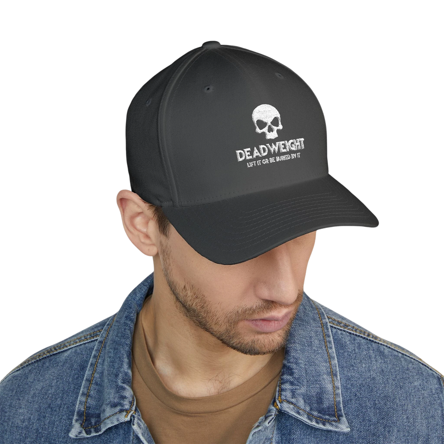 DailyThreadCo. structured flexfit cap in dark grey with white distressed skull embroidery and text on the front.