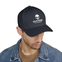 DailyThreadCo. structured flexfit cap featuring a distressed skull embroidery and text on a dark navy fabric.