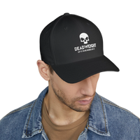 DailyThreadCo. black Flexfit cap featuring a distressed skull embroidery and Deadweight text on a model.