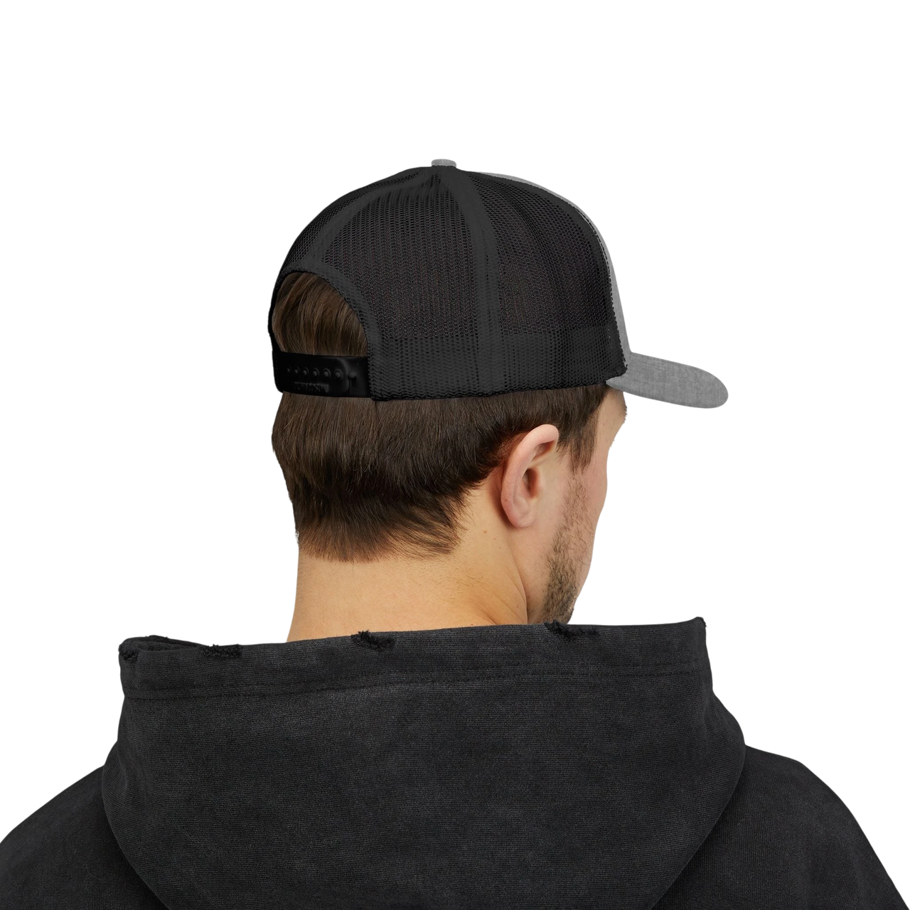 DailyThreadCo. Deadweight skull trucker cap with black mesh back, grey front panels, and adjustable snapback closure.