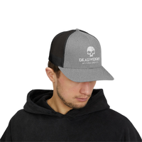 DailyThreadCo. grey and black trucker cap with skull logo, featuring a structured front and breathable mesh back.