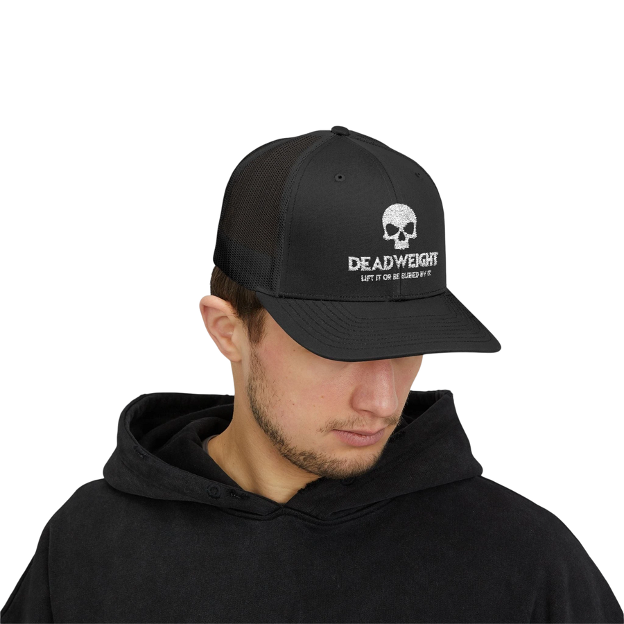 DailyThreadCo. black trucker cap with white skull logo, mesh back, and adjustable snapback for gym and fitness wear.