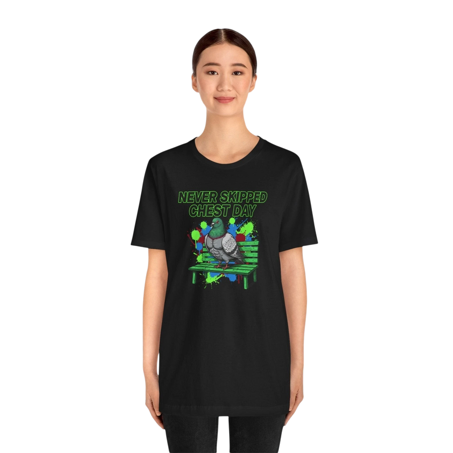 DailyThreadCo. black cotton t-shirt with a graphic print of a pigeon on a bench, text reads "NEVER SKIPPED CHEST DAY".