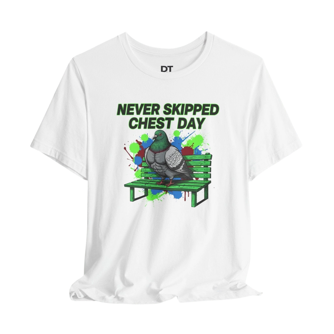 DailyThreadCo. white cotton t-shirt with a graphic print of a muscular pigeon sitting on a green park bench. Text reads "NEVER SKIPPED CHEST DAY."