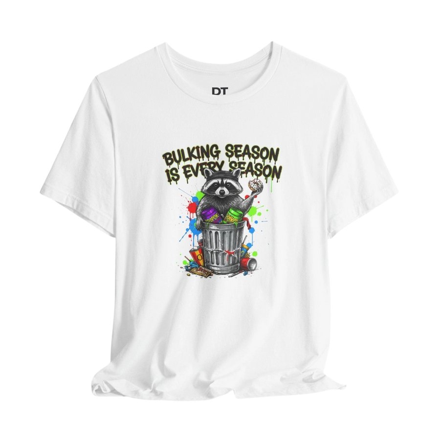 DailyThreadCo. white 100% cotton t-shirt with a graphic of a raccoon in a trash can with the text "BULKING SEASON IS EVERY SEASON".
