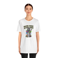 DailyThreadCo. white 100% cotton t-shirt with a graphic of a raccoon in a trash can with the text 
