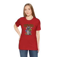 DailyThreadCo red 100% cotton t-shirt with a graphic of a raccoon in a trash can with colorful paint splatters and the text 
