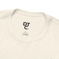 DailyThreadCo. cream 100% cotton t-shirt with Gothic church graphic on back and small chest mark. Size L.