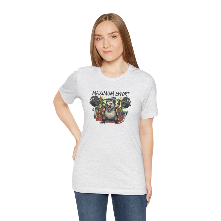 DailyThreadCo. light grey 100% cotton t-shirt with a graphic of a possum lifting a barbell and the text MAXIMUM EFFORT.