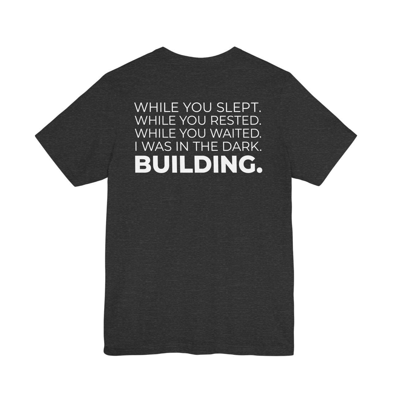 DailyThreadCo. charcoal grey motivational t-shirt with white typographic back print about building in the dark.