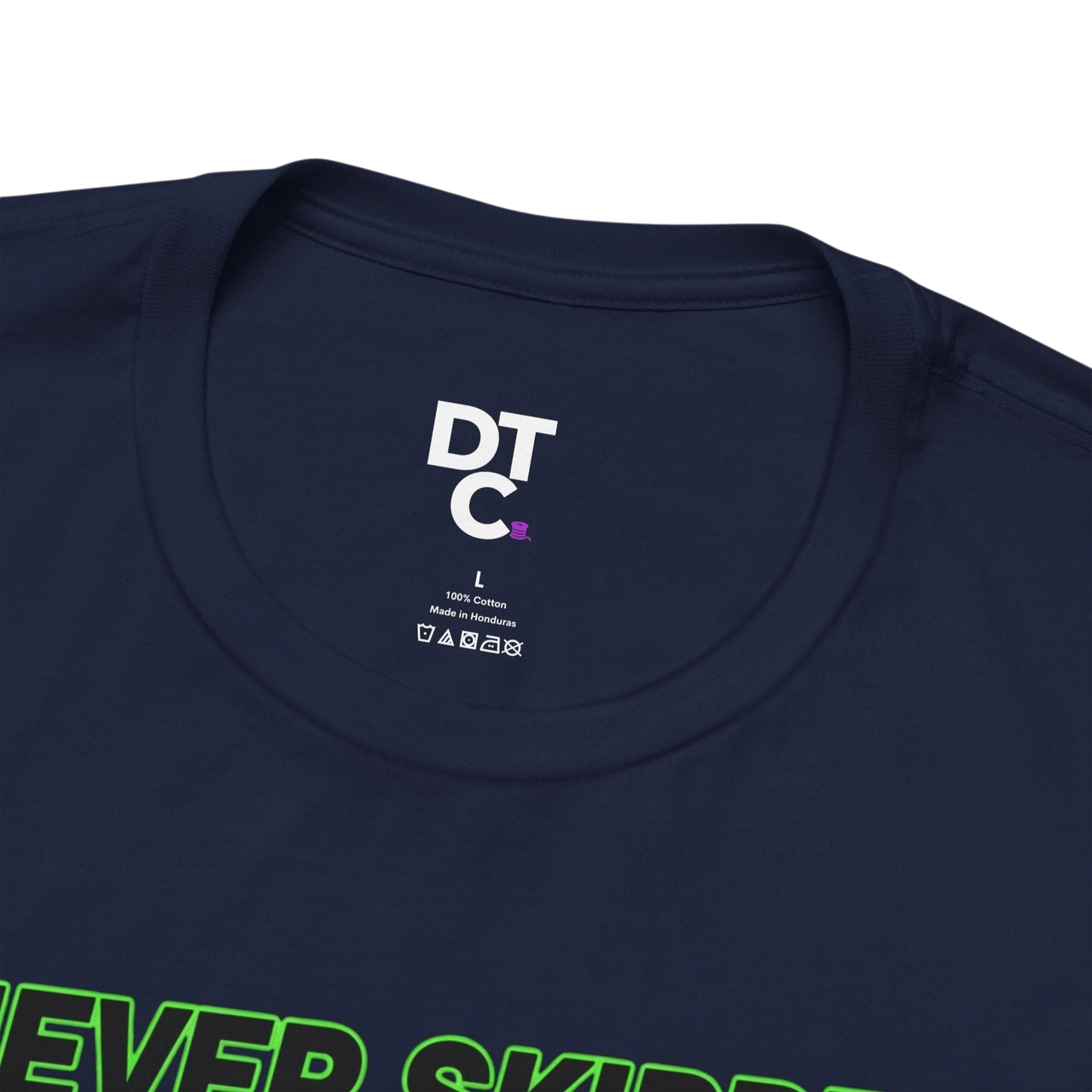 DailyThreadCo. navy blue 100% cotton t-shirt with neon green text graphic that says "Never Skipped Chest Day".