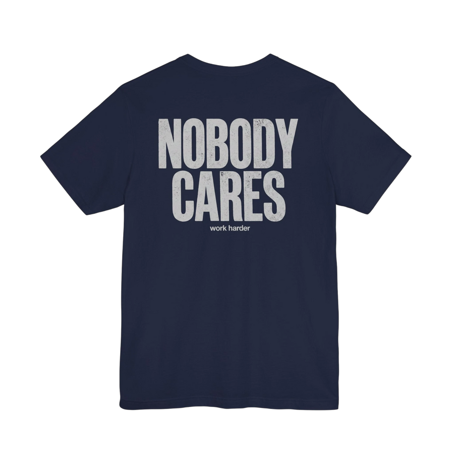 DailyThreadCo. navy blue cotton graphic t-shirt featuring Nobody Cares Work Harder text on the back.