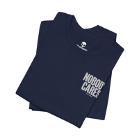 DailyThreadCo. navy blue cotton graphic t-shirt with Nobody Cares text print, folded on a black background.