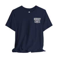 DailyThreadCo. navy blue cotton graphic t-shirt with Nobody Cares print on the chest, featuring a retail fit.