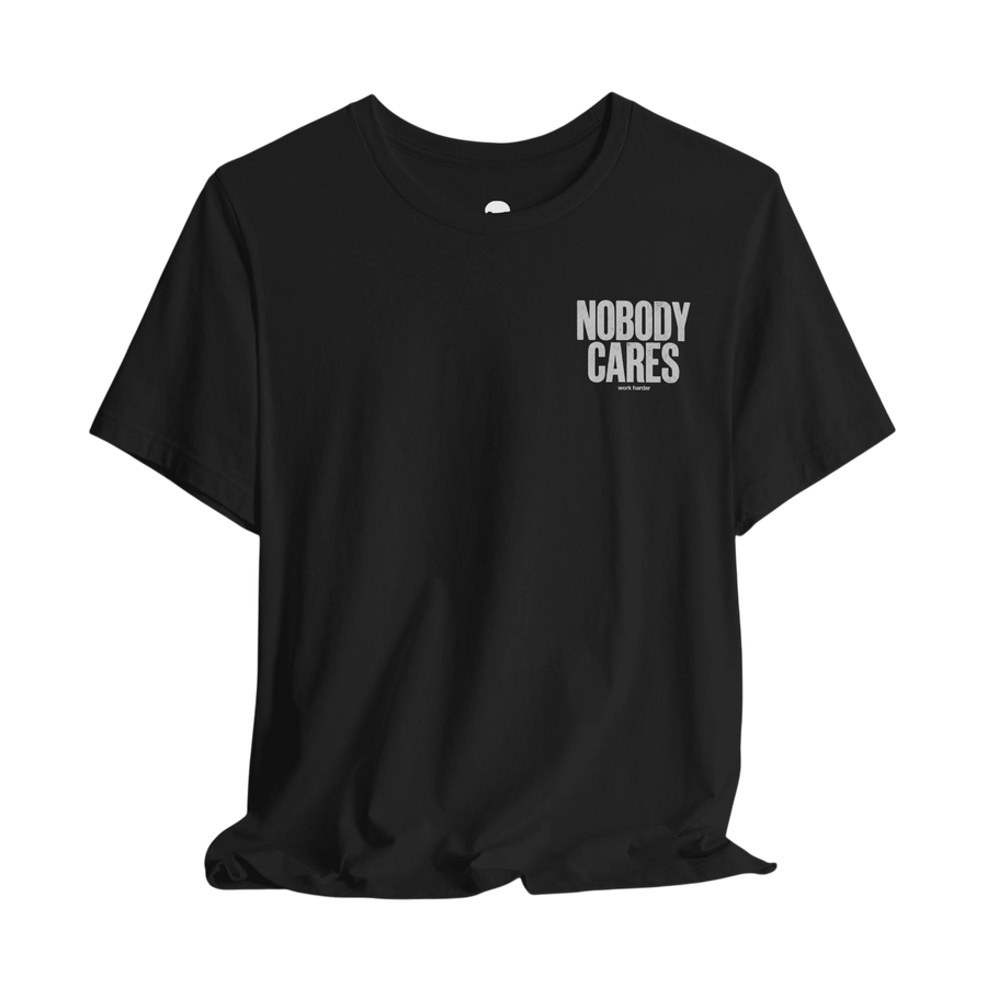 DailyThreadCo. black cotton graphic t-shirt featuring Nobody Cares text on the chest in a clean retail fit.
