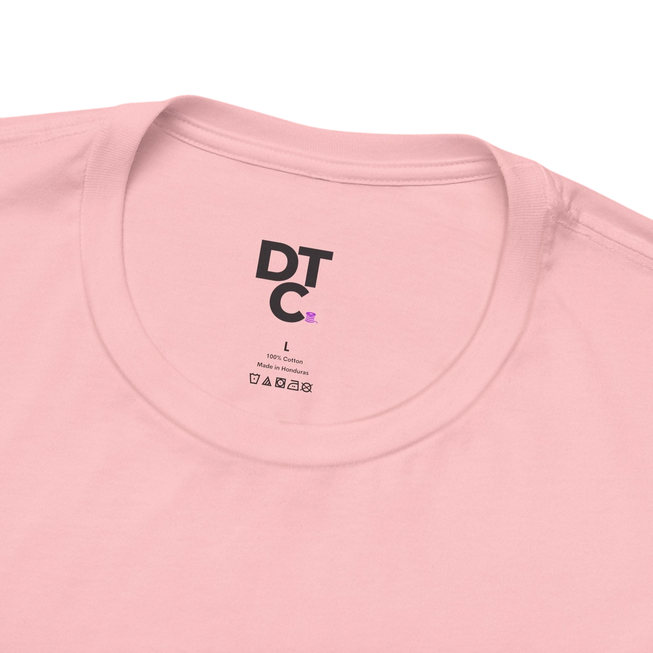 DailyThreadCo. light pink 100% cotton crew neck t-shirt with 'Zero Given' graphic and care instructions tag.