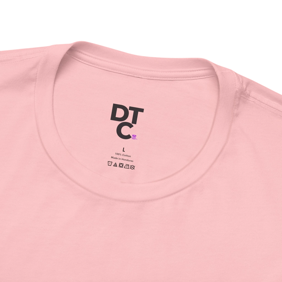 DailyThreadCo. light pink 100% cotton crew neck t-shirt with 'Zero Given' graphic and care instructions tag.