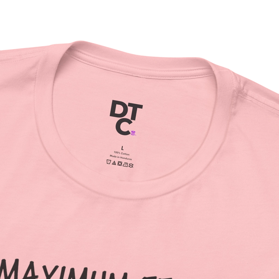 DailyThreadCo. pink 100% cotton t-shirt with "MAXIMUM EFFORT" graphic and DT C logo on tag.