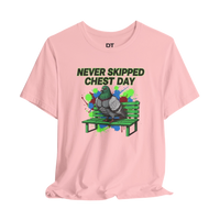DailyThreadCo. pink cotton t-shirt with a graphic of a muscular pigeon on a green park bench. Text reads 