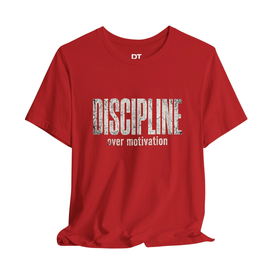 DailyThreadCo red cotton t-shirt with distressed white text reading "DISCIPLINE over motivation" for fitness and motivational wear.