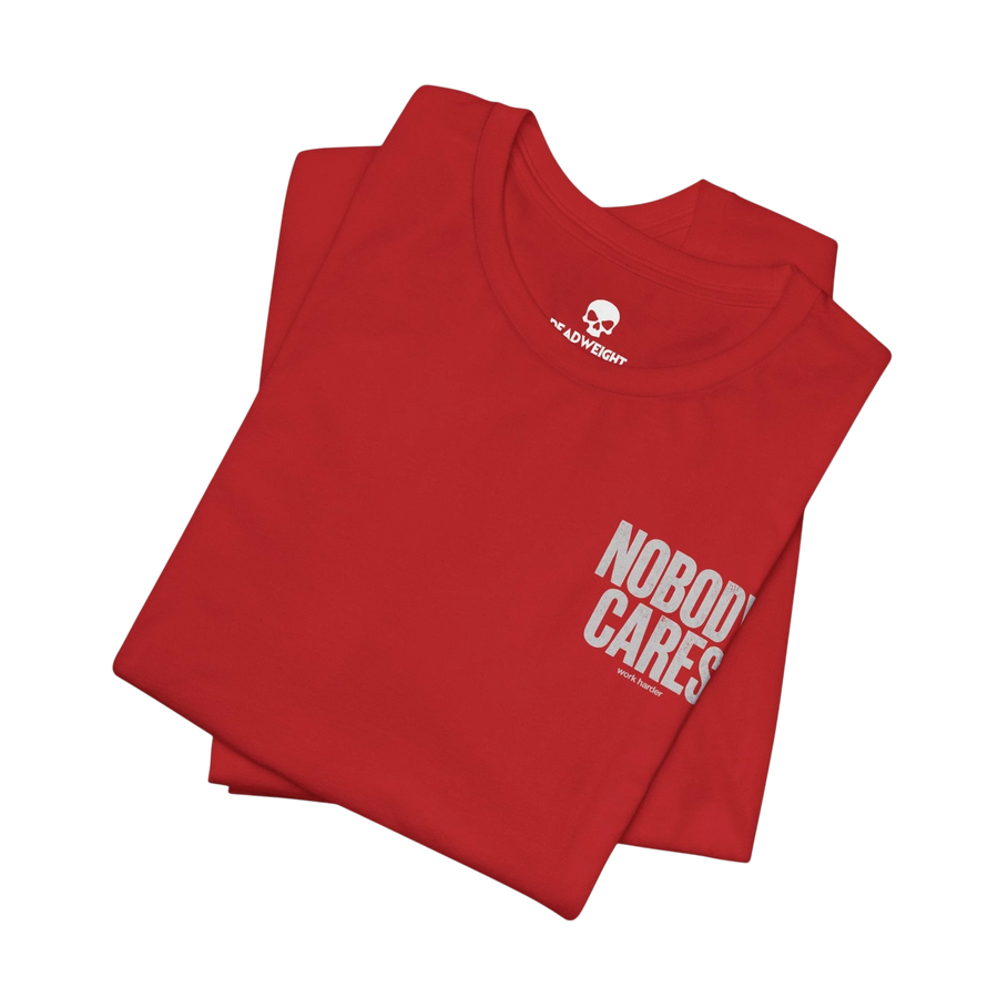 DailyThreadCo. red cotton graphic t-shirt with Nobody Cares print, featuring a crew neck and retail fit.