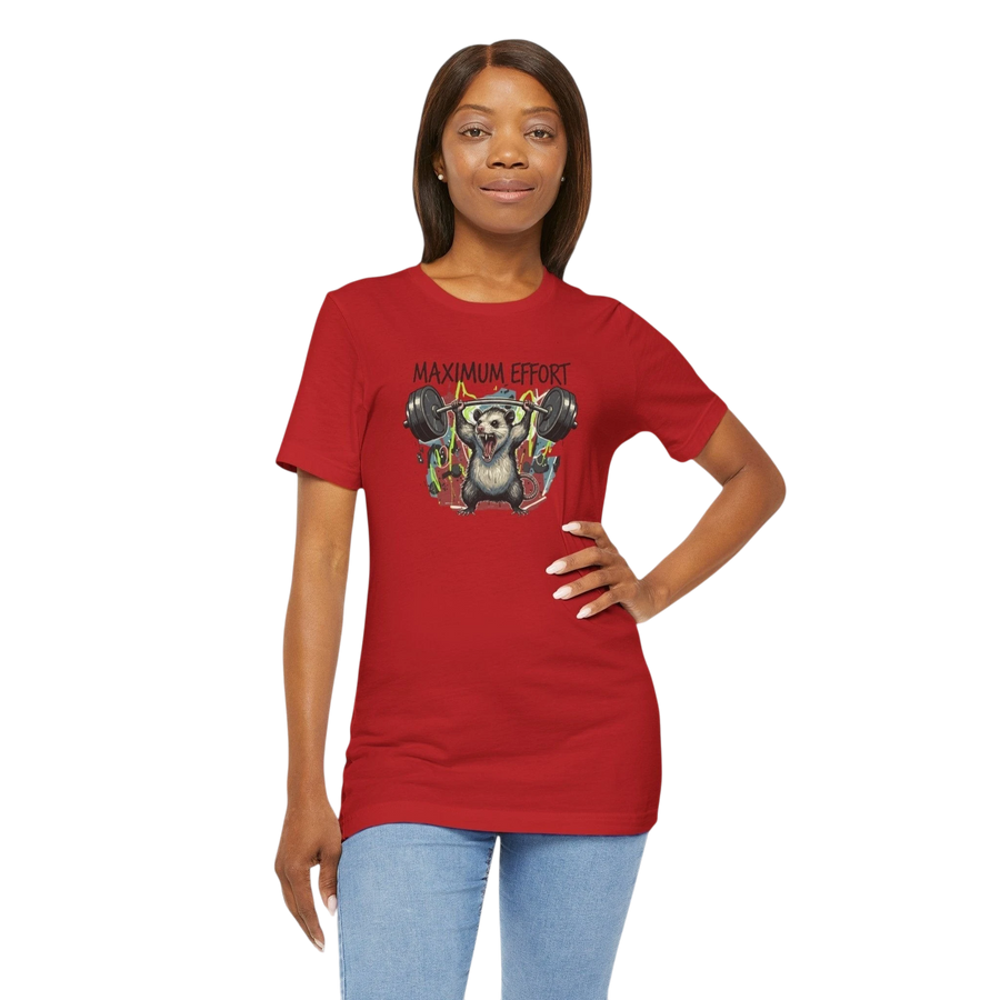 DailyThreadCo red 100% cotton t-shirt with a graphic of a possum lifting weights and the text "MAXIMUM EFFORT".