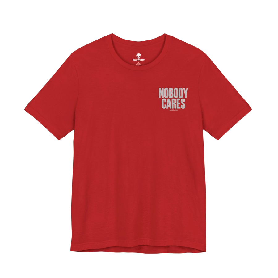 DailyThreadCo. red cotton graphic t-shirt featuring Nobody Cares text on the chest, crew neck, and retail fit.