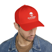 DailyThreadCo. red structured flexfit cap with white distressed skull embroidery and text on a man in denim jacket.