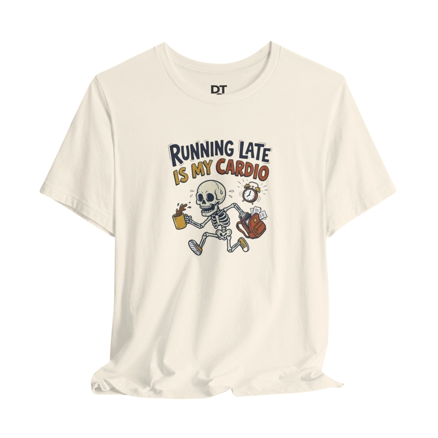 DailyThreadCo. cream cotton t-shirt with a cartoon skeleton running late, holding coffee and a backpack, with the text "Running Late Is My Cardio".