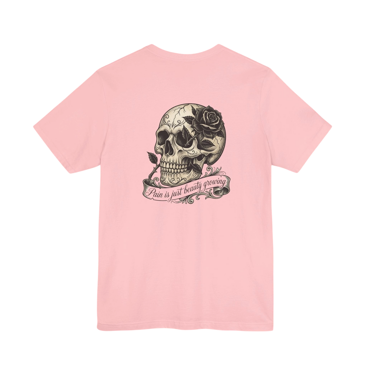 DailyThreadCo. pink cotton t-shirt with a graphic of a skull with a black rose and a banner that reads "Pain is just beauty growing".